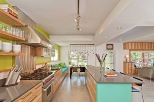 light-wood-kitchen-furniture-with-lime-green-wall-and-open-shelving