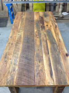 reclaimed-wood-dining-room-table-made-by-jimmy-hovey-resized-600.jpg